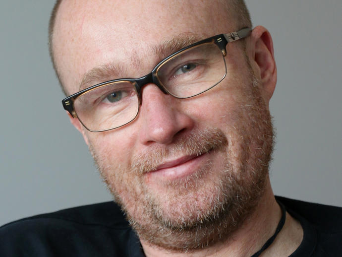 man smiling head shot